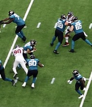 Texans defense kept pressure on Jags QB Trevor Lawrence all game