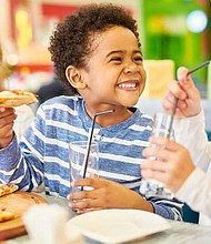 Illinois State Senator Mattie Hunter introduced legislation, Serve Kids better, that was signed into law that would require restaurants that serve children’s meals automatically offer water, milk, 100% fruit or vegetable juice in those meals. Photo provided by Kivvit