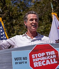 Gov. Gavin Newsom addresses a "Stop the Republican Recall" rally on September 4, in Culver City, California.
Mandatory Credit:	David McNew/Getty Images