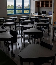 The Nation's largest school district welcomes New York students back to in-person learning. An empty classroom at P.S. 143 in the New York borough of Queens is seen August 18.
Mandatory Credit:	Andrew Lichtenstein/Corbis News/Getty Images
