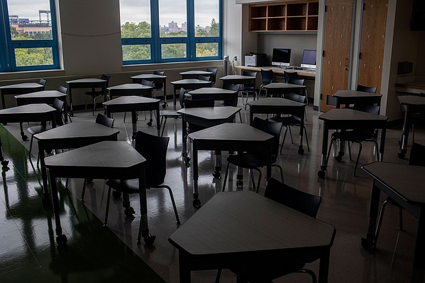 The Nation's largest school district welcomes New York students back to in-person learning. An empty classroom at P.S. 143 in the New York borough of Queens is seen August 18.
Mandatory Credit:	Andrew Lichtenstein/Corbis News/Getty Images