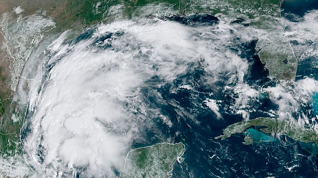 This satellite image provided by NOAA shows Tropical Storm Nicholas in the Gulf of Mexico on Sunday, September 12.
Mandatory Credit:	NOAA/AP