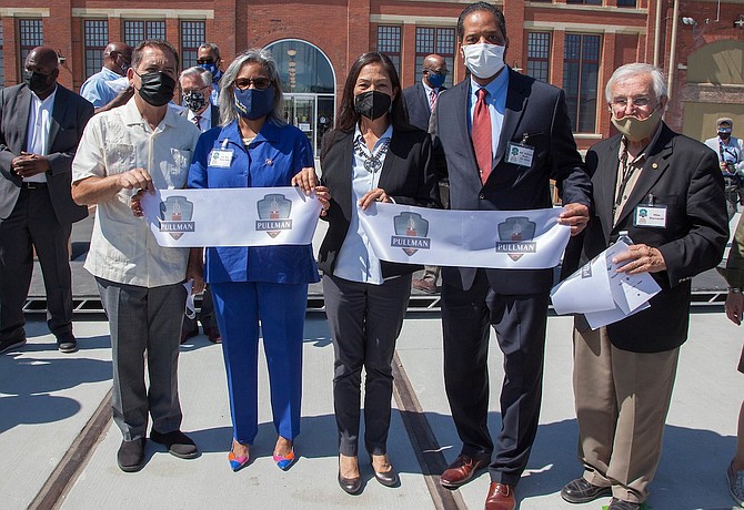 U.S. Representatives Jesús G. "Chuy" Garcia and Robin Kelly, U.S. Interior Secretary Deb Haaland , 9th Ward Alderman Anthony Beale, and Mike Shymanski, founding member of the Historic Pullman Foundation, at the grand opening of Pullman National Monument.  Photo by Antonio Dickey