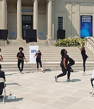 Middle school students with the Binford Dance Company perform during the event.