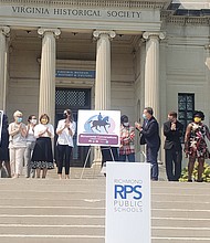 Richmond Public Schools, School Board, City Council and other officials applaud the unveiling of the “Monumental Conversations” app last Sunday outside the Virginia Museum of History & Culture.