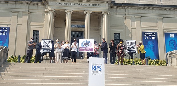 Richmond Public Schools, School Board, City Council and other officials applaud the unveiling of the “Monumental Conversations” app last Sunday outside the Virginia Museum of History & Culture.