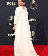 Elizabeth Olsen wore a gown designed by her sisters to Sunday's Emmy Awards.
Mandatory Credit:	Rich Fury/Getty Images