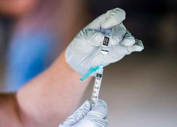 A nurse fills a syringe with a dose of BioNTech, Pfizer Covid-19 vaccine. Four words — "do your own research" — are hurting the US pandemic response, CNN's chief media correspondent Brian Stelter said on "Reliable Sources" September 19.
Mandatory Credit:	Ben Hasty/MediaNews Group/Reading Eagle/Getty Images