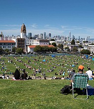 San Francisco has been crowned the "world's best" city, according to Time Out. People here relax at a park in San Francisco, on May 24, 2020.
Mandatory Credit:	Li Jianguo/Xinhua/Getty Images
