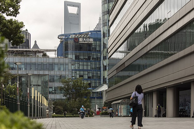 Shares of Evergrande fell more than 10% in Hong Kong.
Mandatory Credit:	Qilai Shen/Bloomberg/Getty Images