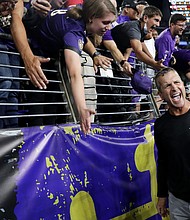 Harbaugh celebrates after defeating the Kansas City Chiefs.
Mandatory Credit:	Todd Olszewski/Getty Images