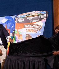 Jabari Paul of Ben & Jerry's and Monifa Bandele of Movement 4 Black Lives unveil Ben & Jerry's newest flavor.