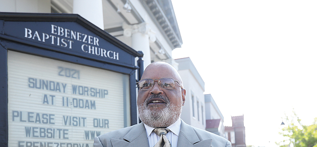 J. Maurice Hopkins stands outside Ebenezer Baptist Church in Jackson Ward, where he and William “Bunny” Roane were the first Eagle Scout candidates in Boy Scout Troop 478 under the leadership of Scoutmaster Linwood D. Ross.
