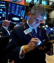 Trader John Panin works on the floor of the New York Stock Exchange, Wednesday, September 22.
Mandatory Credit:	Richard Drew/AP