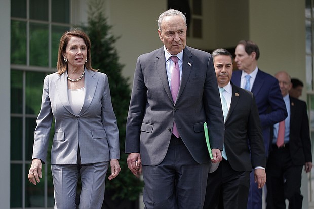 House Speaker Nancy Pelosi and Senate Majority Leader Chuck Schumer are seen here after meeting with other House and Senate Democrats.
Mandatory Credit:	Chip Somodevilla/Getty Images