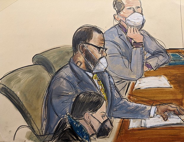 In this courtroom sketch, R. Kelly, center, sits with his defense attorneys Thomas Farinella, top, and Nicole Blank Becker during the first day of his defense in his sex trafficking case, Monday, September 20 in New York.
Mandatory Credit:	Elizabeth Williams/AP