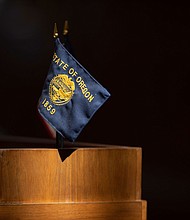 Oregon approves the nation's first new congressional map. The Oregon State flag is pictured here at the Oregon State Capitol in Salem, Oregon on September 20.
Mandatory Credit:	Brian Hayes/Statesman Journal/Imagn Content Services