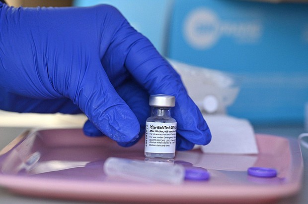 New York Gov. Kathy Hochul signs an executive order to address potential health care worker shortages as vaccine mandate begins. Pictured is a vaccine clinic in Los Angeles, on August 23.
Mandatory Credit:	Robyn Beck/AFP/Getty Images