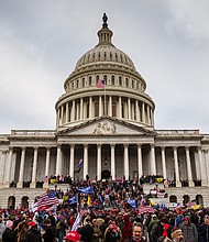 Republicans' enthusiasm for prosecuting Capitol rioters has fallen, Pew poll finds. Pro-Trump protesters stormed the Capitol Building in Washington, DC, on January 6.
Mandatory Credit:	Jon Cherry/Getty Images