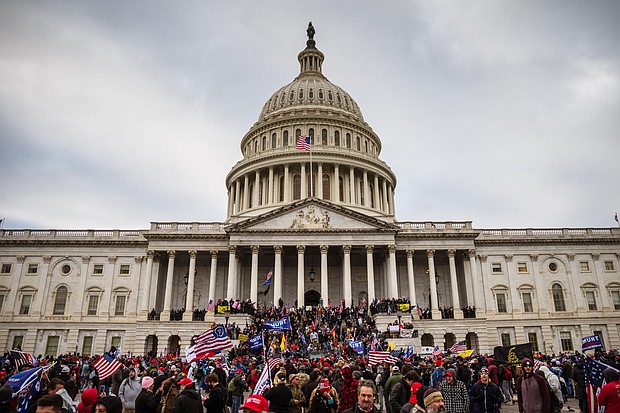 Republicans' enthusiasm for prosecuting Capitol rioters has fallen, Pew poll finds. Pro-Trump protesters stormed the Capitol Building in Washington, DC, on January 6.
Mandatory Credit:	Jon Cherry/Getty Images