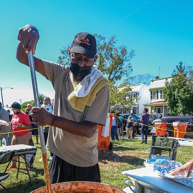 Crabs & Q
Crabs, gumbo and burgers were among the plentiful fare last Saturday at “Coming Out of the Corona Crab & Q,” a free community event in the East End encouraging people to vote, stop the violence, get vaccinated against COVID-19 and advocate for new city schools to be built. Hundreds of people enjoyed the food, music and camaraderie being outdoors and in the sunshine. The event, held outside the Bacon Retirement Community at 815 N. 35th St., was sponsored by James E. “JJ” Minor III, and numerous groups, including the Richmond Branch NAACP, the Help Me Help You Foundation, United Communities Against Crime and health care organizations. Darryl Jordan stirs one of his pots of gumbo.