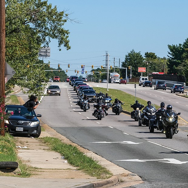 Riding with a message-A line of motorcycles and cars parade through the city last Saturday promoting a message to end the violence in low-income areas and raise money for families of shooting victims. This was the fifth annual event sponsored by Kattz Angelz motorcycle group. The 75-minute ride started on Mechanicsville Turnpike in Henrico County, wound through several public housing communities in Richmond and ended at a Harley-Davidson outlet on Hull Street Road in Chesterfield County, where participants enjoyed food and music.