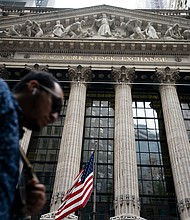 The Dow dropped more than 350 points, or 1.1%, in the late morning. The S&P 500, a broader gauge of the US stock market, was down 1.4%. The Nasdaq Composite fell the most with a 2.1% decline. Pedestrians are shown here passing the New York Stock Exchange, Monday, Oct. 4, 2021, in the Manhattan borough of New York.
Mandatory Credit:	John Minchillo/AP