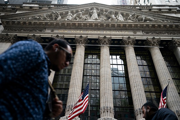 The Dow dropped more than 350 points, or 1.1%, in the late morning. The S&P 500, a broader gauge of the US stock market, was down 1.4%. The Nasdaq Composite fell the most with a 2.1% decline. Pedestrians are shown here passing the New York Stock Exchange, Monday, Oct. 4, 2021, in the Manhattan borough of New York.
Mandatory Credit: John Minchillo/AP