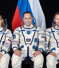 Soyuz MS-19 crew members include (from left) actress Yulia Peresild, veteran Russian cosmonaut Anton Shkaplerov and film producer Klim Shipenko. This portrait was taken at the Gagarin Cosmonaut Training Center in Russia.
Mandatory Credit:	NASA