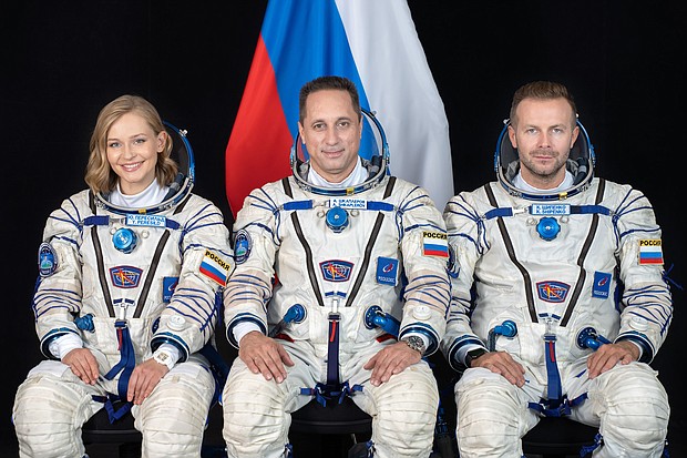 Soyuz MS-19 crew members include (from left) actress Yulia Peresild, veteran Russian cosmonaut Anton Shkaplerov and film producer Klim Shipenko. This portrait was taken at the Gagarin Cosmonaut Training Center in Russia.
Mandatory Credit:	NASA