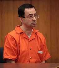 Deputy Attorney General Lisa Monaco said Tuesday that new information has emerged concerning two former FBI agents accused of mishandling the investigation into allegations of abuse against former USA Gymnastics doctor Larry Nassar. Nassar is shown here in court listening to statements before being sentenced by Judge Janice Cunningham for three counts of criminal sexual assault in Eaton County Circuit Court on February 5, 2018 in Charlotte, Michigan.
Mandatory Credit:	Scott Olson/Getty Images