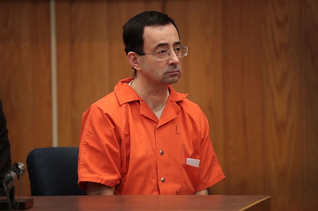 Deputy Attorney General Lisa Monaco said Tuesday that new information has emerged concerning two former FBI agents accused of mishandling the investigation into allegations of abuse against former USA Gymnastics doctor Larry Nassar. Nassar is shown here in court listening to statements before being sentenced by Judge Janice Cunningham for three counts of criminal sexual assault in Eaton County Circuit Court on February 5, 2018 in Charlotte, Michigan.
Mandatory Credit:	Scott Olson/Getty Images