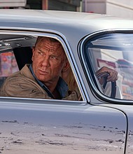 Daniel Craig says "No Time to Die" should be experienced in the theater.
Mandatory Credit:	Nicola Dove/DANJAQ, LLC AND MGM.  ALL RIGHTS RESERVED