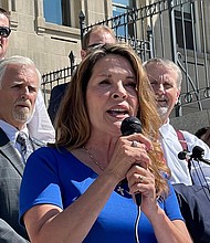 An extraordinary public feud between Idaho's two top leaders escalated on Tuesday when the state's governor, Brad Little, accused fellow Republican Lt. Gov. Janice McGeachin of overstepping her authority by ordering the state National Guard to the US-Mexico border while he was in Texas visiting the border. McGeachin is shown here at a rally on the Statehouse steps in Boise, Idaho on September 15, 2021.
Mandatory Credit:	Keith Ridler/AP