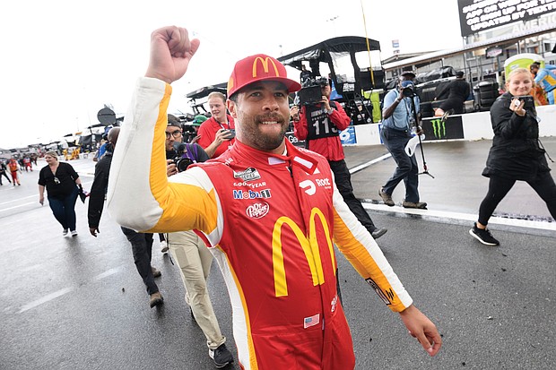 Bubba Wallace celebrates after winning the NASCAR Cup Series auto race Monday in Talladega, Ala., where he led the pack before a rain delay.