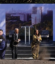 Former President Obama and former First Lady Michelle Obama use shovels to ceremonially break ground Tuesday to officially kick off construction of the Obama Presidental Center in Jackson Park on Chicago’s South Side. They are joined by Illinois Gov. J.B. Pritzker, left, and Chicago Mayor Lori Lightfoot, right.