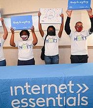 Comcast began a week-long tour across Illinois promoting digital equity. The Internet Essentials initiative celebrates its 10th year anniversary, providing low-cost broadband for low-income households. The tour kicked off with its first stop to the village of Dolton where students were presented with laptops. Photo provided by Comcast.