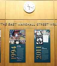 This display of four panels tells the story of African-Americans whose bodies were stolen from graves, used as teaching tools for Richmond medical students before the Civil War and then discarded in a nearby well. Location of panels: Outside the auditorium of the Hermes A. Kontos Medical Sciences Building, 1217 E. Marshall St., on the medical campus of Virginia Commonwealth University. The bones of the unidentified people were found in a long-capped well in 1994 during the construction of the building. The university and two community committees set up by VCU have considered how to properly honor the remains that are now in custody of the state Department of Historic Resources. Dr. Peter Buckley, dean of the VCU School of Medicine, called the display the latest effort by the school to recognize the humanity of those involved and “to honor and demonstrate our respect for the lives of these ancestors.” The panels, from left to right, present a timeline of events involving the remains from 1844 to 2019.