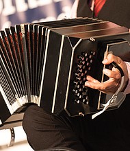 Rodolfo Zanetti plays the bandoneon, an instrument in the concertina family, with the Pedro Giraudo Tango Ensemble.