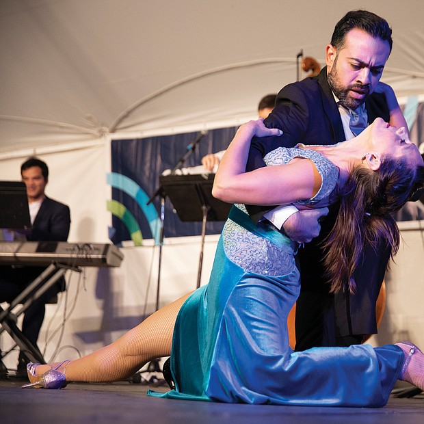 Leonardo Sardella and Mariana Parma dance an Argentine tango on the Community Foundation Stage in front of a grateful audience.