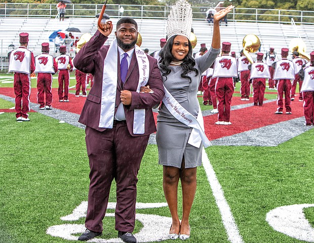 Rain couldn’t dampen the enthusiasm of the students, alumni and supporters attending Virginia Union University’s homecoming last Saturday at Willie Lanier Field at Hovey Stadium on the Lombardy Street campus. Mr. and Miss VUU 2021-22 Kirk Jones and Eboné Giles wave to the crowd during their introduction at halftime.