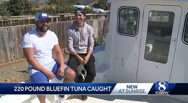 Carlos Morales (left) and Arthur Melgoza (right) on their fishing boat in Monterey, California. The fishermen pulled in a 220-pound, 83-inch long bluefin tuna.
Mandatory Credit:	KSBW