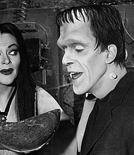 Lily Munster (Yvonne De Carlo) holds a giant ladle for Herman Munster (Fred Gwynne) in an episode of the original "The Munsters."
Mandatory Credit:	Getty Images