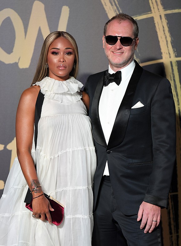 Eve is definitely feeling satisfaction... The hip-hop queen, 42, announced Friday she's expecting a child with husband Maximillion Cooper.