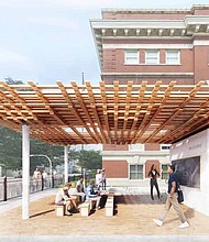 An outdoor pavilion, constructed by Skidmore, Owens and Merrill, at Epic Academy for the Chicago Architecture Biennial is being used as an outdoor learning lab, as well as a space for the community. Photo by Kendall McCaugherty © Hall+Merrick Photographers