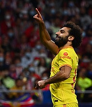 Liverpool narrowly edged past 10-man Atletico Madrid in an all-time classic Champions League encounter, as the two sides shared five goals in the Spanish capital.
Mandatory Credit:	GABRIEL BOUYS/AFP/AFP via Getty Images