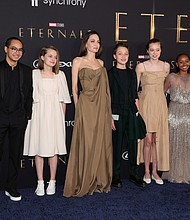 (L-R) Maddox  Jolie-Pitt, Vivienne Jolie-Pitt, Angelina Jolie, Knox Jolie-Pitt, Shiloh Jolie-Pitt, and Zahara Jolie-Pitt attend Marvel Studios' "Eternals" premiere on October 18 in Los Angeles, California.
Mandatory Credit:	Rich Fury/Getty Images