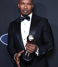 Jamie Fox, seen here in February 2020, says there's a "whole lot of love" in his family and he just doesn't need the "pressure" of being married.
Mandatory Credit:	Robin L Marshall/Getty Images/BET