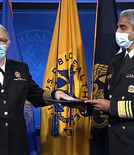 Dr. Rachel Levine (left), the Assistant Secretary for Health at the US Department of Health and Human Services, made history on October 19 as the first openly transgender four-star officer across the nation's eight uniformed services.
Mandatory Credit:	HHS