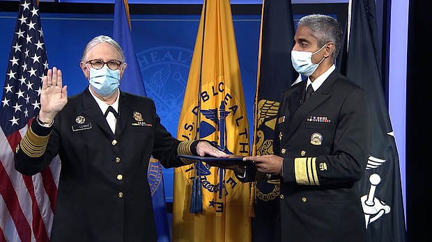 Dr. Rachel Levine (left), the Assistant Secretary for Health at the US Department of Health and Human Services, made history on October 19 as the first openly transgender four-star officer across the nation's eight uniformed services.
Mandatory Credit:	HHS